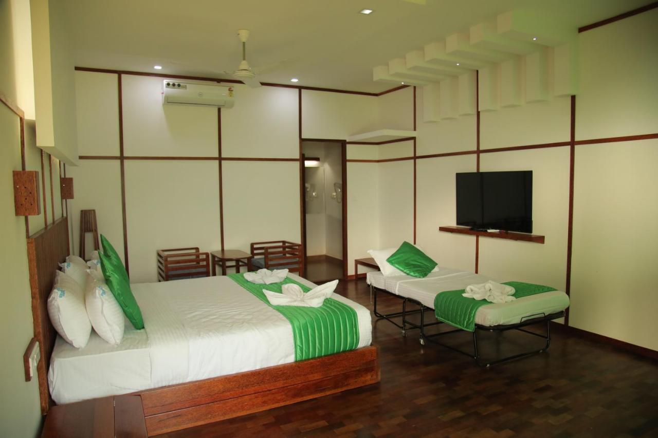 Dream Coconut Villa Resort Мунар Екстериор снимка